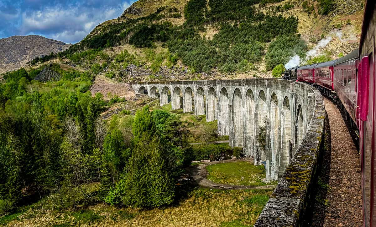 The view from The Jacobite steam train as it steams across the Glenfinnan viaduct.