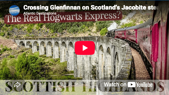 Image shows view from inside the Jacobite Express steam train as it crosses the Glenfinnan viaduct.  Train journeys are perfect for travel over 50.